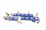 Miniature Worker Team Building Word Happy New Year On White Background Stock Photo