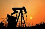 Pumpjack Pumping Crude Oil From Oil Well Stock Photo