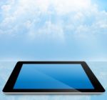 Tablet Pc With Cloudy Sky Stock Photo