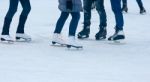 Legs Of People Skating Closeup Stock Photo