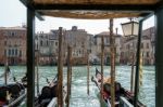 Gondolas Moored Along A Canal In Venice Stock Photo