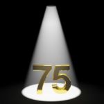 Golden Number Of 75 With Spotlit Stock Photo