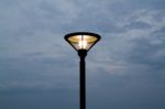 Lamp Post With Stormy Sky Stock Photo