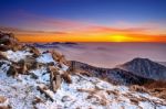 Winter Landscape With Sunset And Foggy In Deogyusan Mountains, South Korea Stock Photo