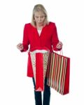 Senior Lady Holding Shopping Bag Stock Photo