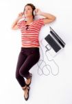 Woman Listening To Music With Headphones Stock Photo