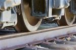 Old Train Wheels And The Road Stock Photo