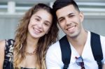 Young Students Looking At The Camera After Class Stock Photo