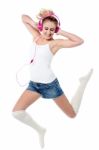 Music Lover Jumping High In The Air Stock Photo