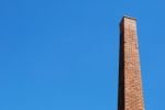 Old Brick Tower Chimney From A Old Factory Stock Photo