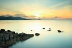 Seascape Sunsset With Fantastic Rock Stock Photo