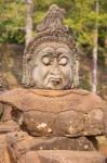 Statue Of Ancient Khmer Warrior Head At Angkor Wat Stock Photo