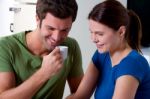 Couple Drinking Coffee Kitchen Stock Photo