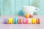 Vintage Colorful  Macarons On Pink Wooden Background Stock Photo