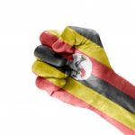 Flag Of Uganda On Hand Stock Photo