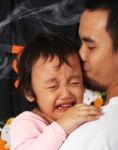 Father Carrying His Crying Child Stock Photo