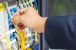 People Fix Node Fiber Optic In Network Room Stock Photo