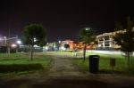 Night Public Park In The City With Houses Near Stock Photo