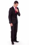 Businessman Adjusting His Tie Stock Photo