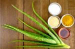 Facial Treatment Recipe With Fresh Aloe Vera On Wood Background Stock Photo