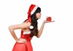 Santa Woman  Holding A Gift Box Stock Photo