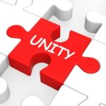 Unity Puzzle Shows Team Teamwork Or Collaboration Stock Photo