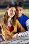 Young Couple In The Park Stock Photo