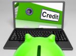 Credit Laptop Means Online Lending Or Repayments Stock Photo