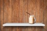 Iced Coffee On Shelf On Old Wooden Background Stock Photo