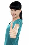 Attractive Woman Showing Thumbs Up Gesture Stock Photo