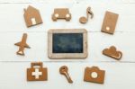 Cardboard Web Icons And An Old Blackboard On White Background Stock Photo