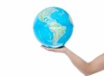 Closeup Of Man Hand Holding A Globe Stock Photo