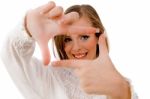 Close View Of Smiling Woman Showing Framing Hand Gesture Stock Photo