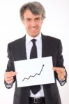 Businessman With Chart Stock Photo