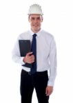 Male Architect Holding Clipboard Stock Photo