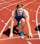 A Male Athlete Ready To Run The Race Stock Photo