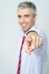 Handsome Businessman Pointing At You Stock Photo