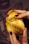 Pear With Measuring Tape Stock Photo