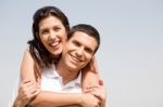 Young Man Piggyback His Girlfriend Stock Photo