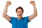 Successful Excited Isolated Young Guy Stock Photo