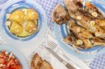 Grilled European Seabass With Potato And Tomato Salad Stock Photo