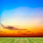 Soccer Field With Beautiful Sunset Background Stock Photo