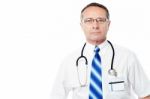 Aged Male Doctor With Lab Coat Stock Photo