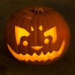 Carved Lit Halloween Pumpkin Stock Photo