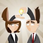 Cartoon Businessman And Businesswoman With Idea Bulb Stock Photo