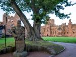 Wooden Knight In The Grounds Of Peckforton Castle Stock Photo