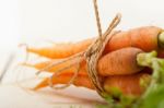 Baby Carrots Bunch Tied With Rope Stock Photo