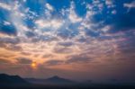 Sunrise Rays On Morning Blue Orange Sky Cloud With Mountain Stock Photo