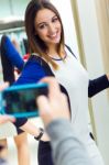 Beautiful Couple Shopping In A Clothes Shop Stock Photo