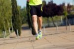 Handsome Young Man Running In The Park Stock Photo